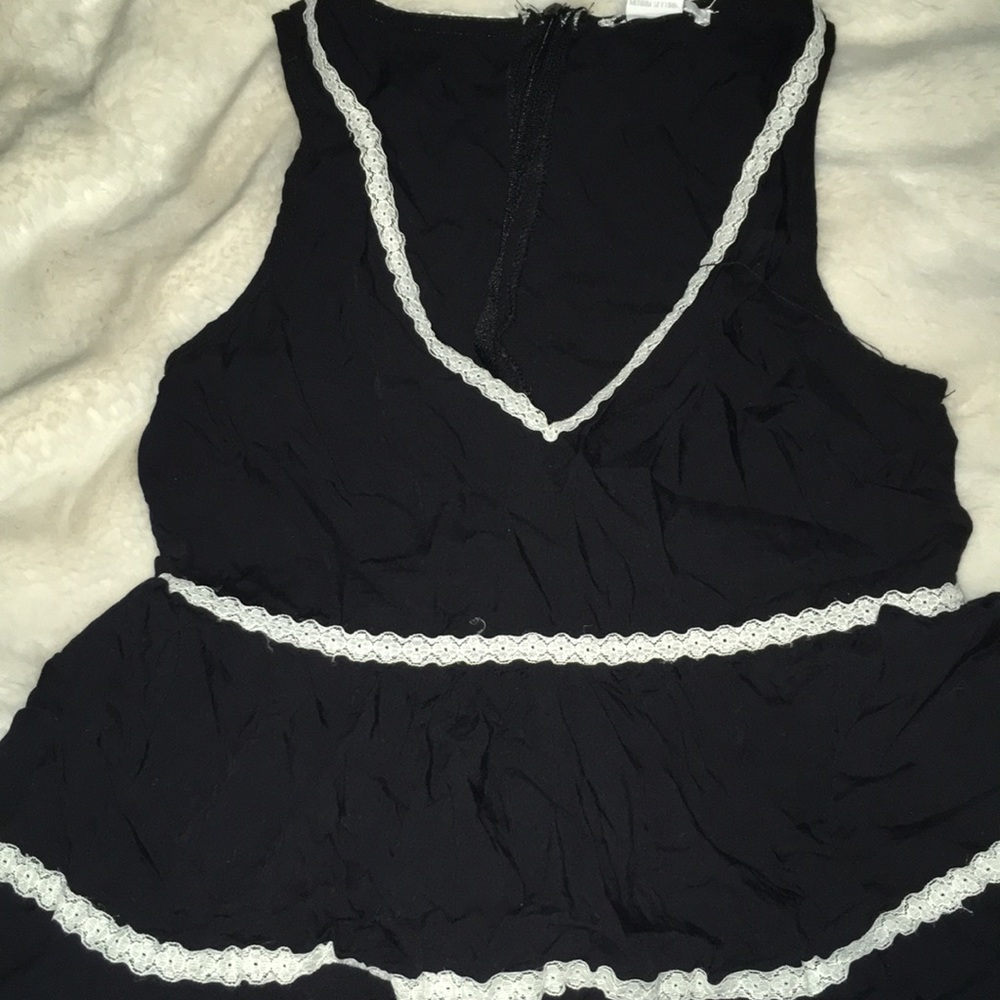 Delia’s black tank with white lace trimming